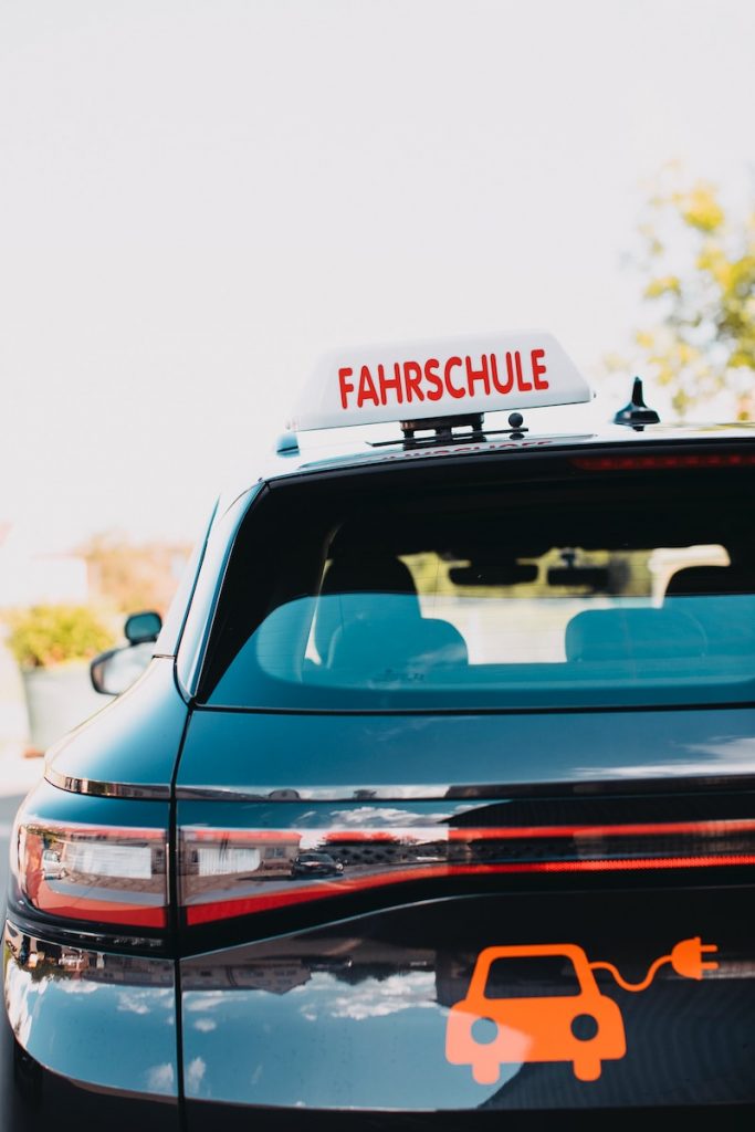 a close up of a car with a fahreschule sticker on it